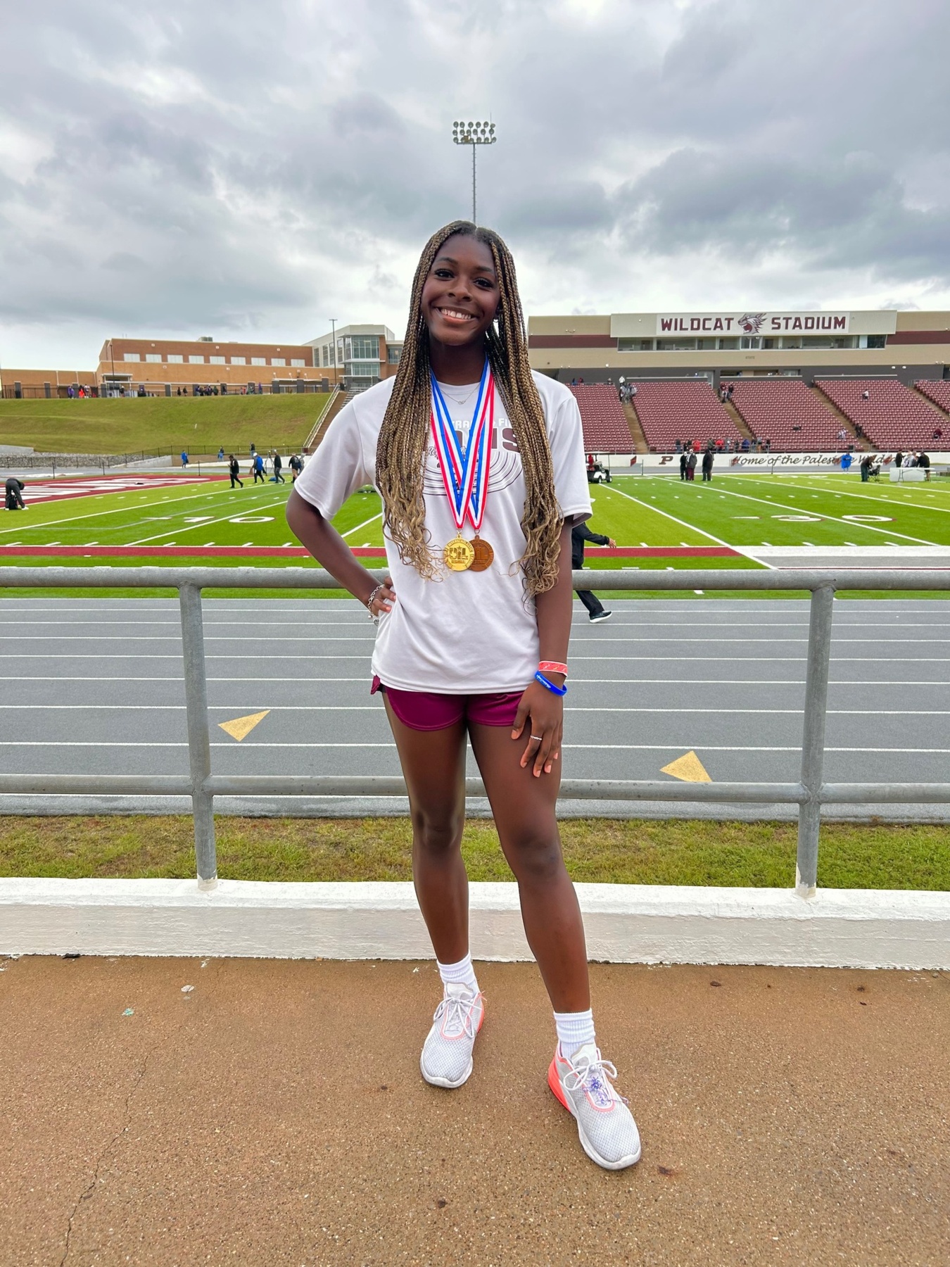 A'nyya Mitchell on qualify for State in the 100 m hurdles and triple jump